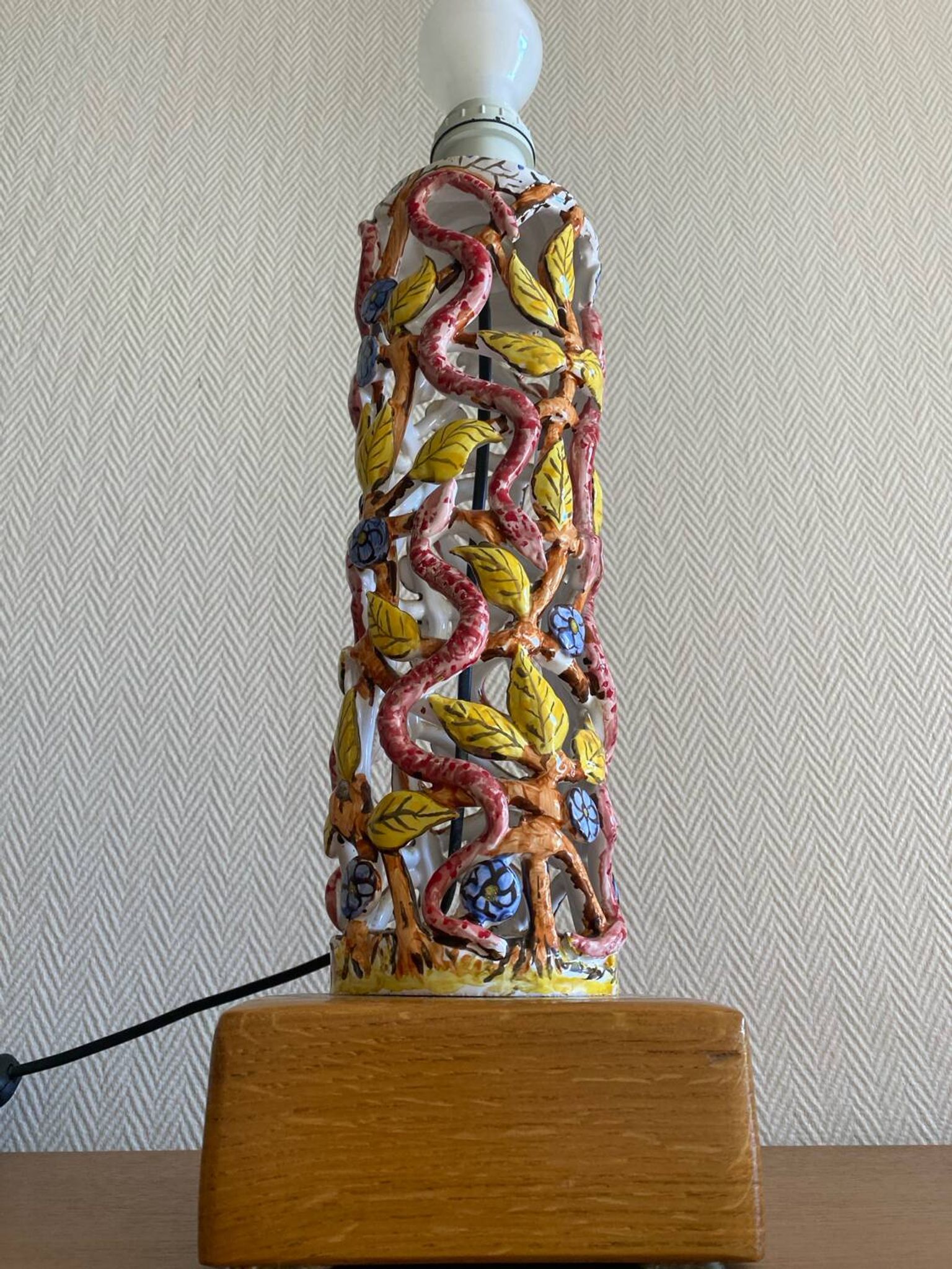 Openwork ceramic lamp base with Garden of Eden decor