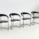 Ensemble de 8 chaises de salle à manger vintage Arrben Ursala en cuir noir.