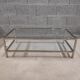 Vintage bevelled glass coffee table and lightly gilded square metal tubes from the 70s/80s