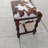 Vintage cowhide trunk stool