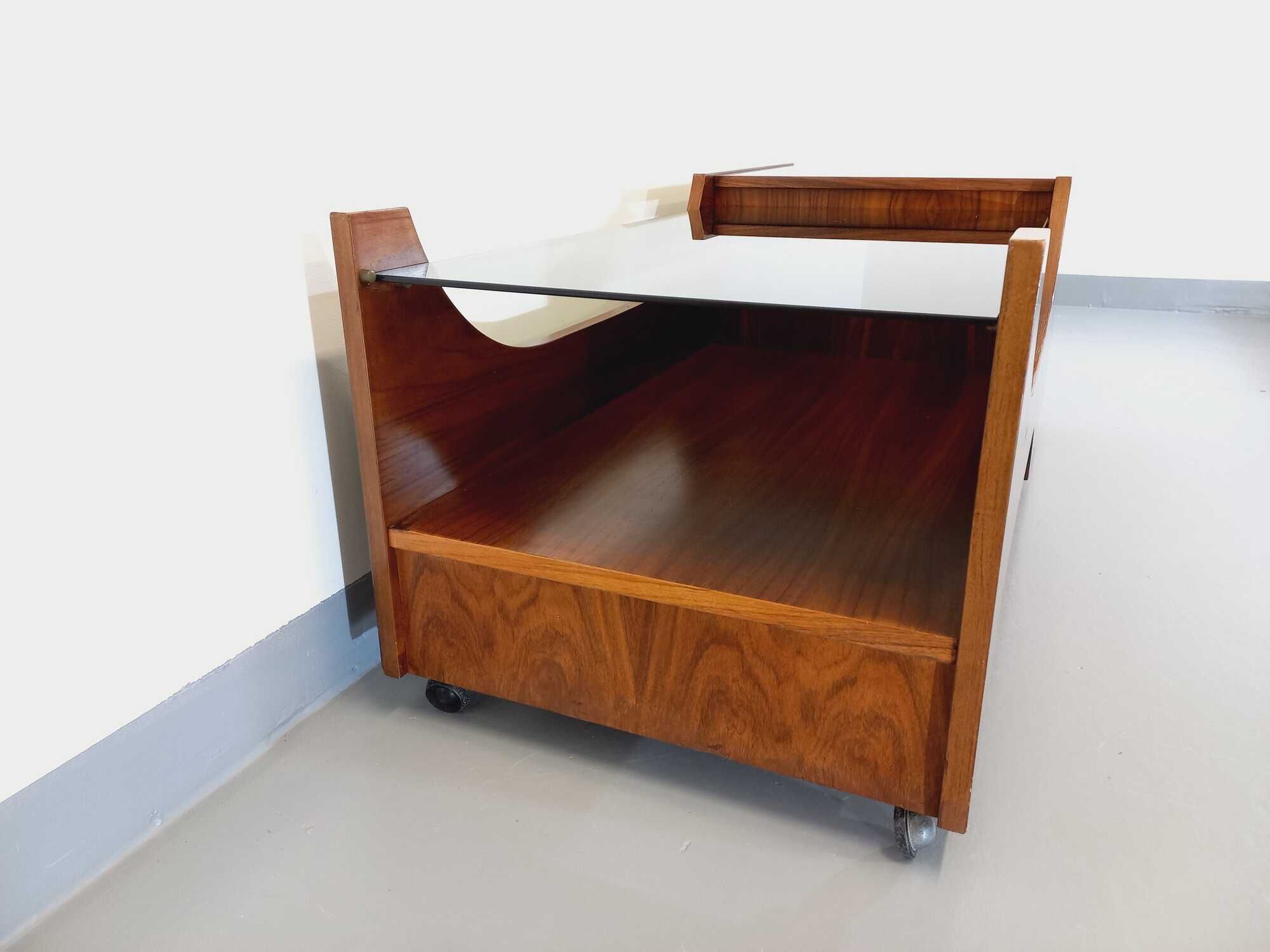 Vintage bar coffee table on rosewood wheels and smoked glass from the 60s