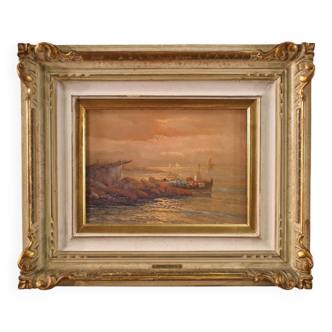 Seascape painting signed by Remo Testa, fishermen at sunset
