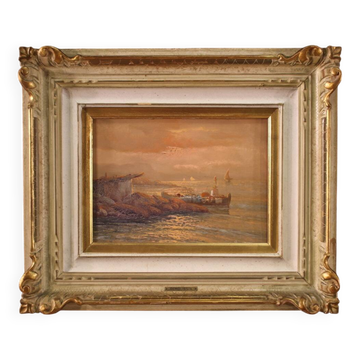 Seascape painting signed by Remo Testa, fishermen at sunset