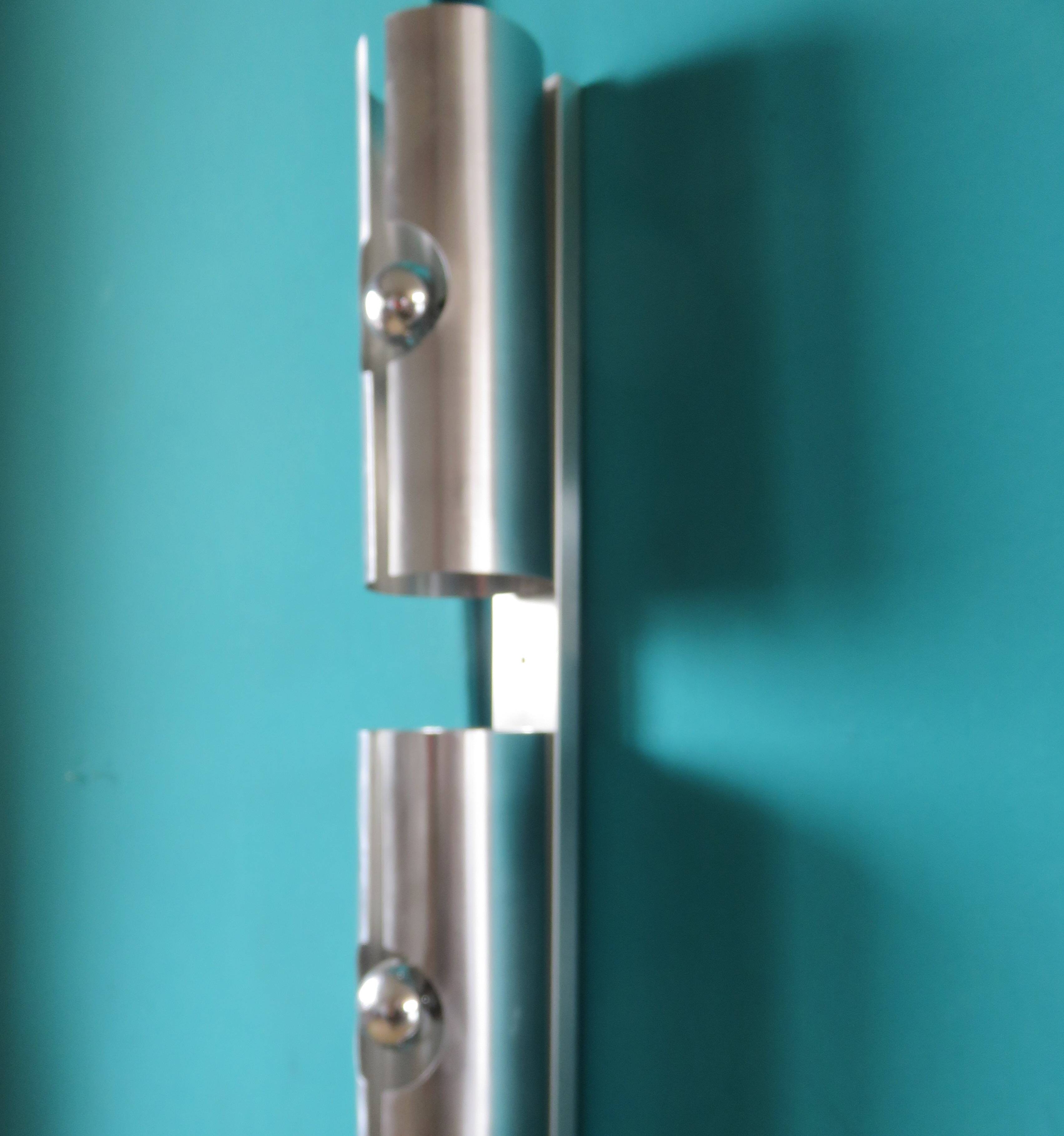 Long "SpaceAge" wall lamp in brushed aluminum. France 1970