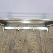 Wall-mounted coat rack, rosewood, gold-tone brass, Austria, 1960s.