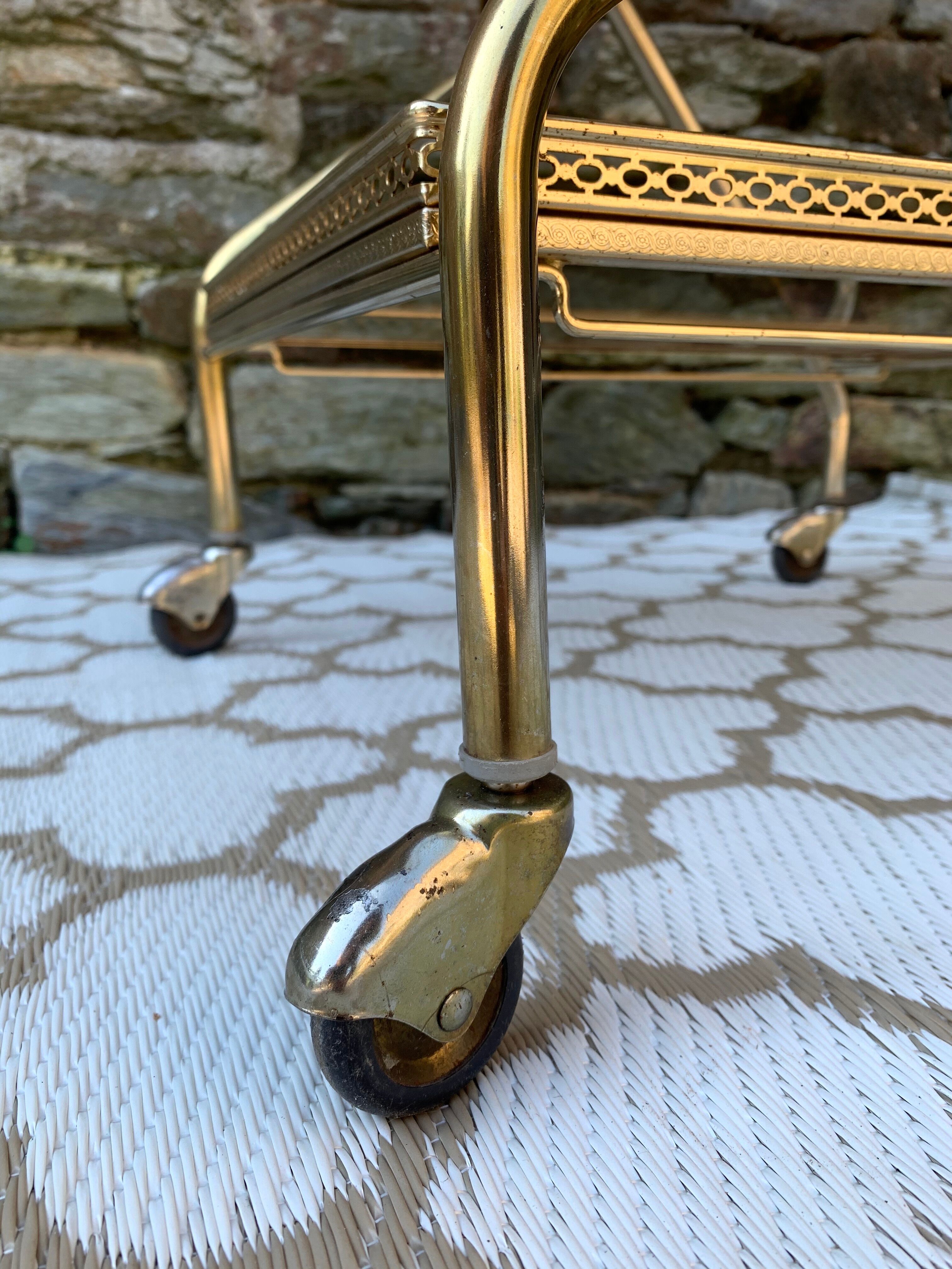 Golden dessert with wheeled glass tray