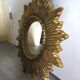 Golden sunburst convex vintage mirror from the 1960s.