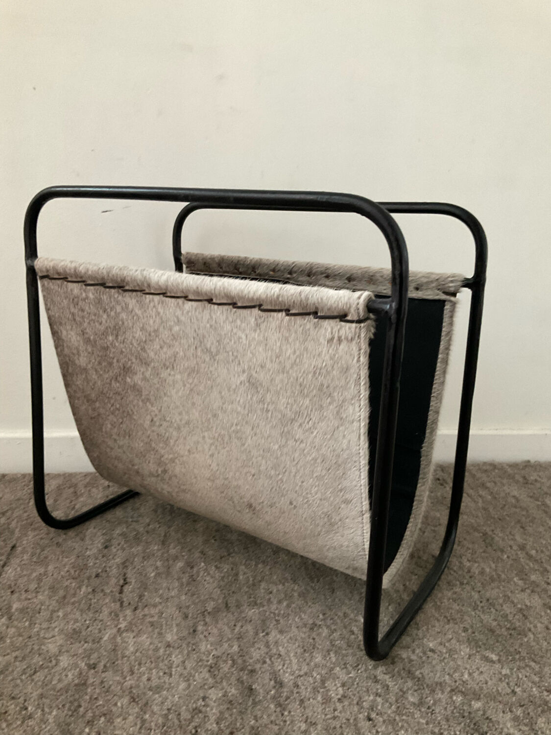 Vintage magazine holder in metal and leather