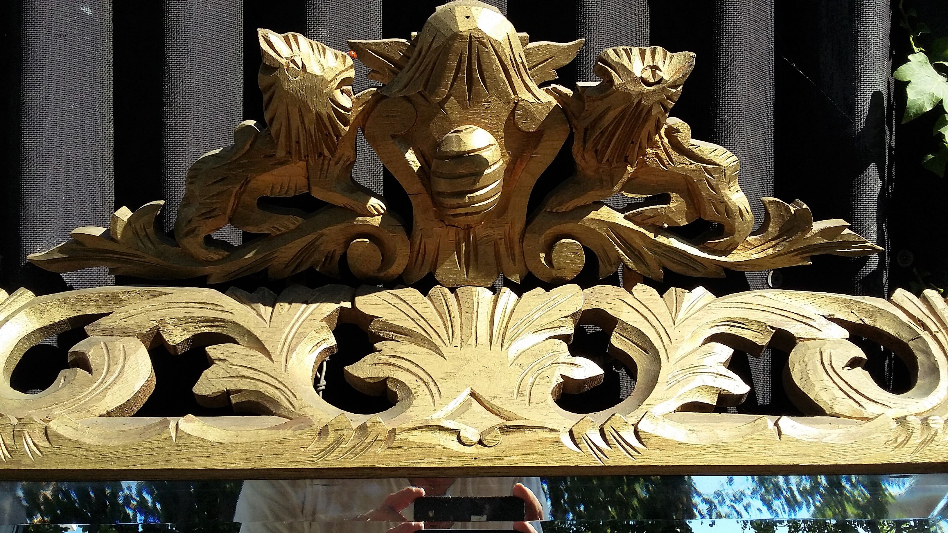 Renaissance style mirror in gilded wood