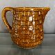 Digouin and Sarreguemines ceramic pitcher with braided decoration
