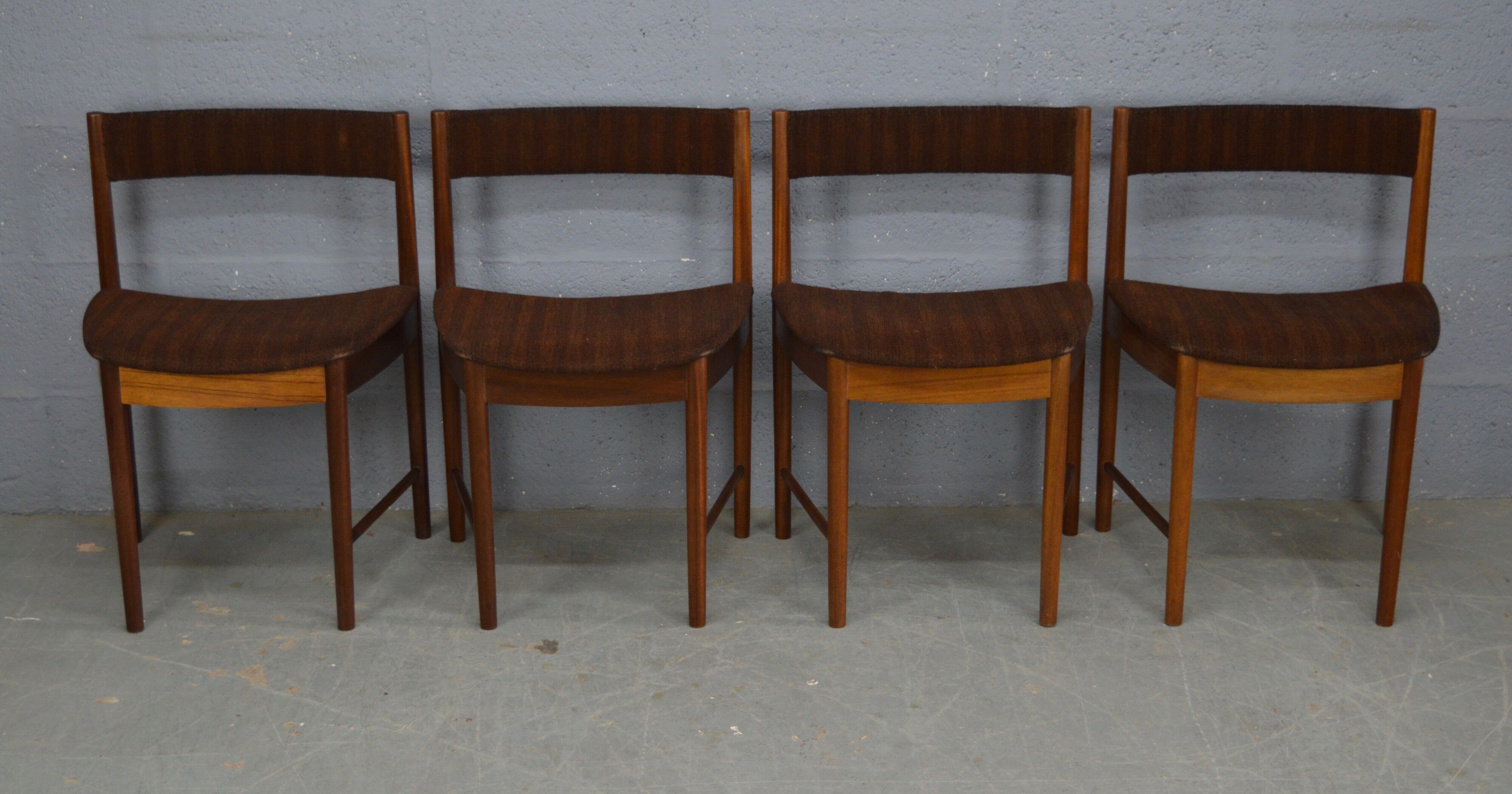 Round teak dinning table and chairs by Mctintosh