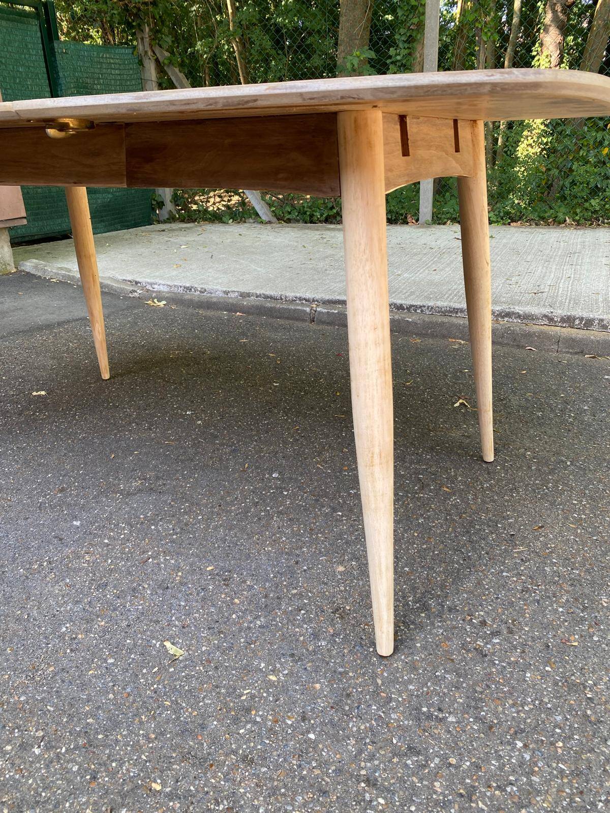 Renovated Scandinavian extendable dining table in teak and veneer from 1980.
