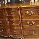 Patinated baroque crossbow chest of drawers