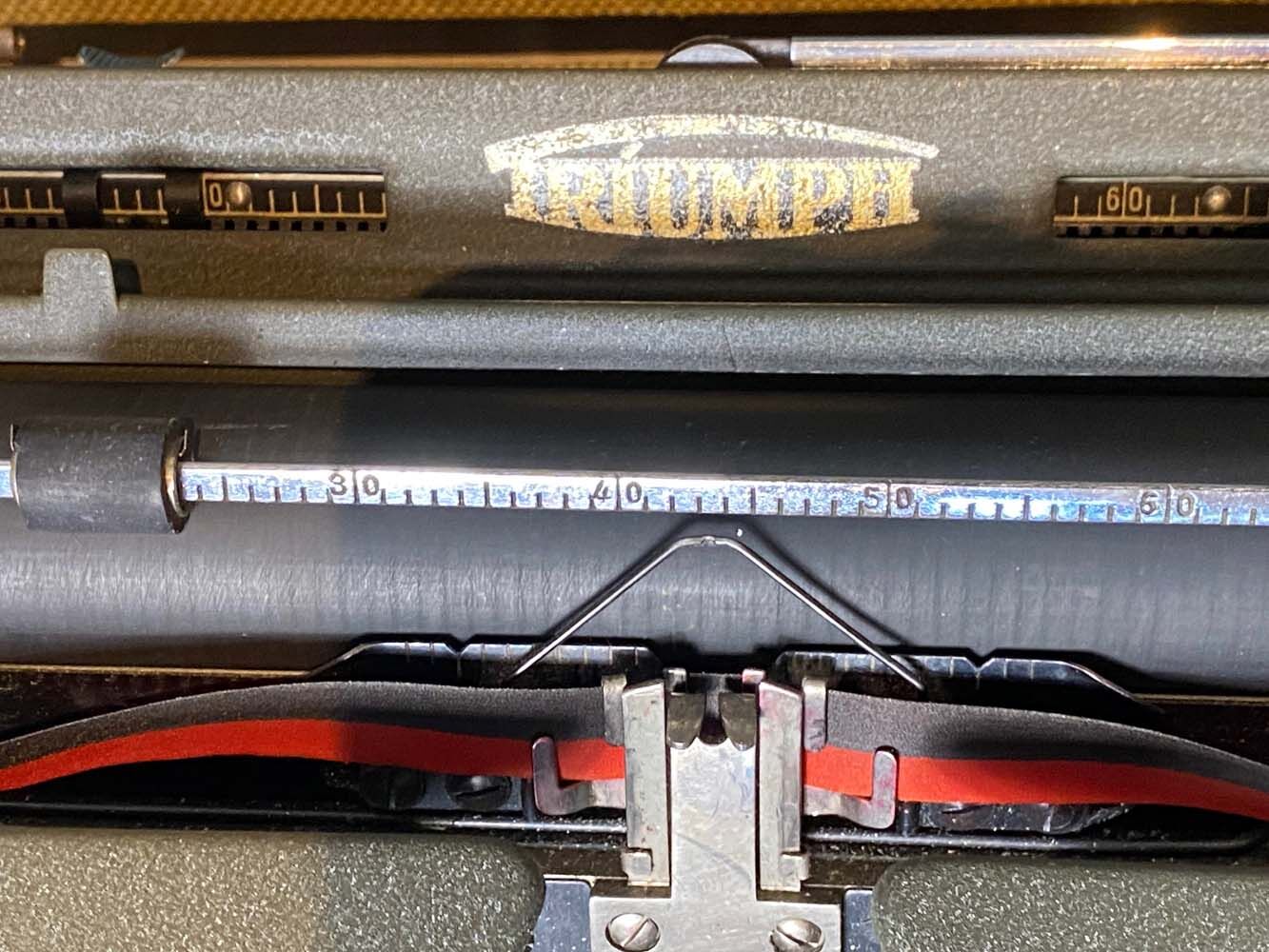 Triumph perfekt typewriter with its transport box.