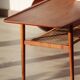 Vintage Scandinavian coffee table in teak and rattan – Danish design from the 1960s.