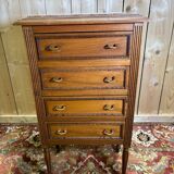 Louis XVI style molded and carved walnut chest of drawers