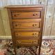 Louis XVI style molded and carved walnut chest of drawers