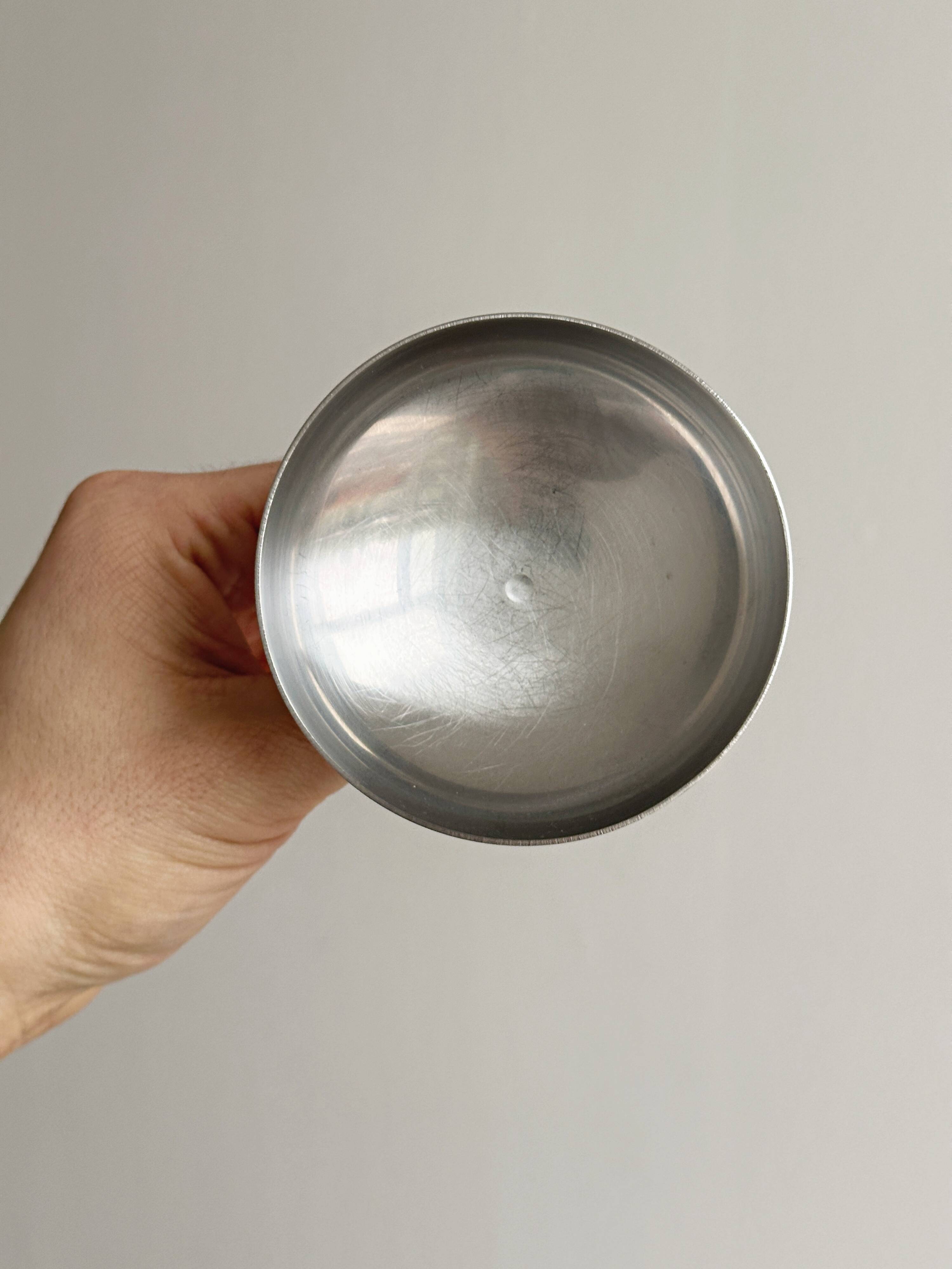 6 metal bowls in the style of Guy Degrenne