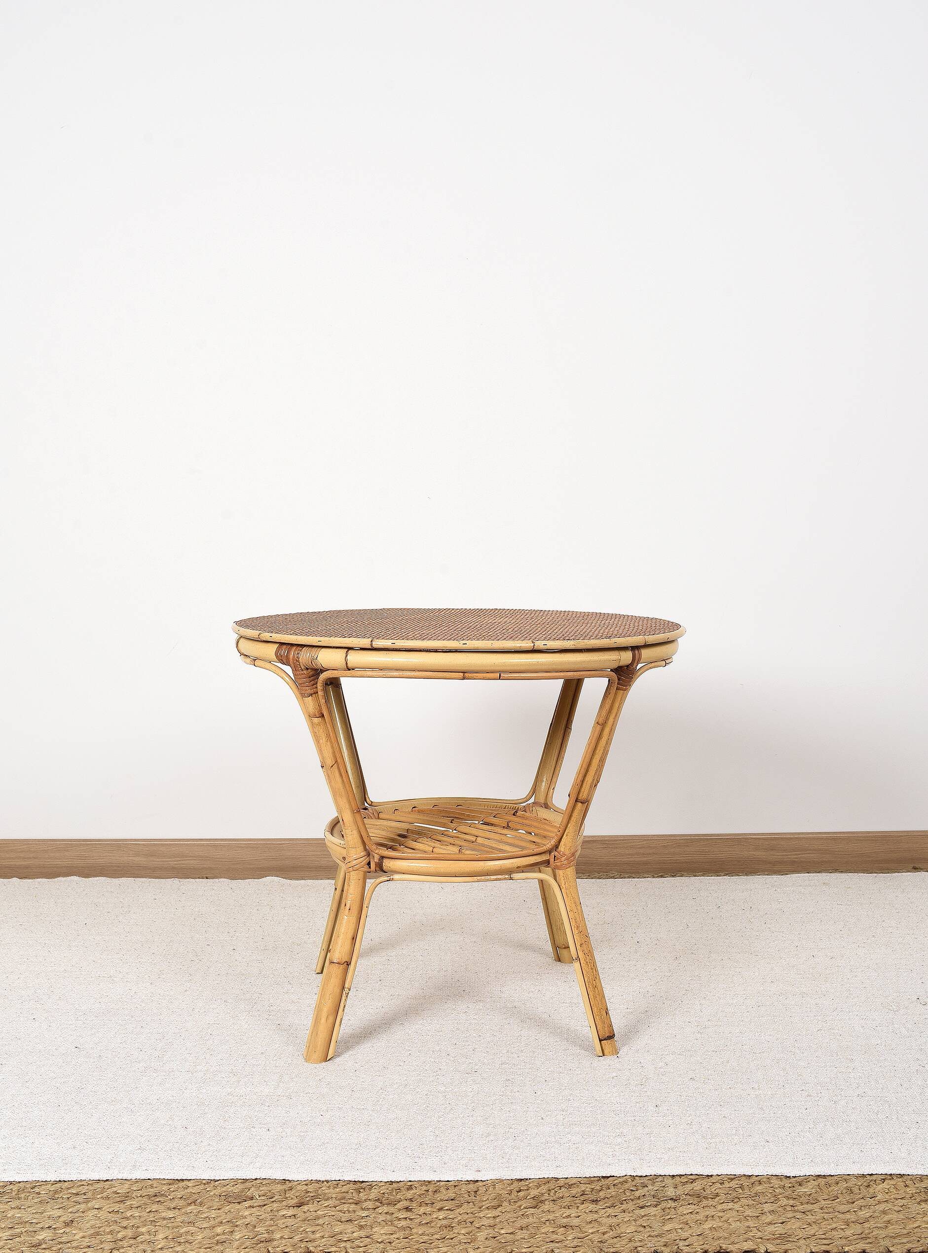 Old round rattan table, vintage from the 70s - 80s. Small table, or side table.
