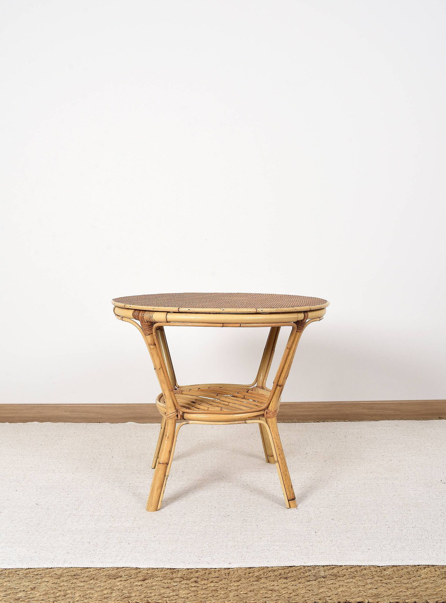 Old round rattan table, vintage from the 70s - 80s. Small table, or side table.