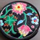 Pair of Longwy flower bottle underwear on black background. Rare