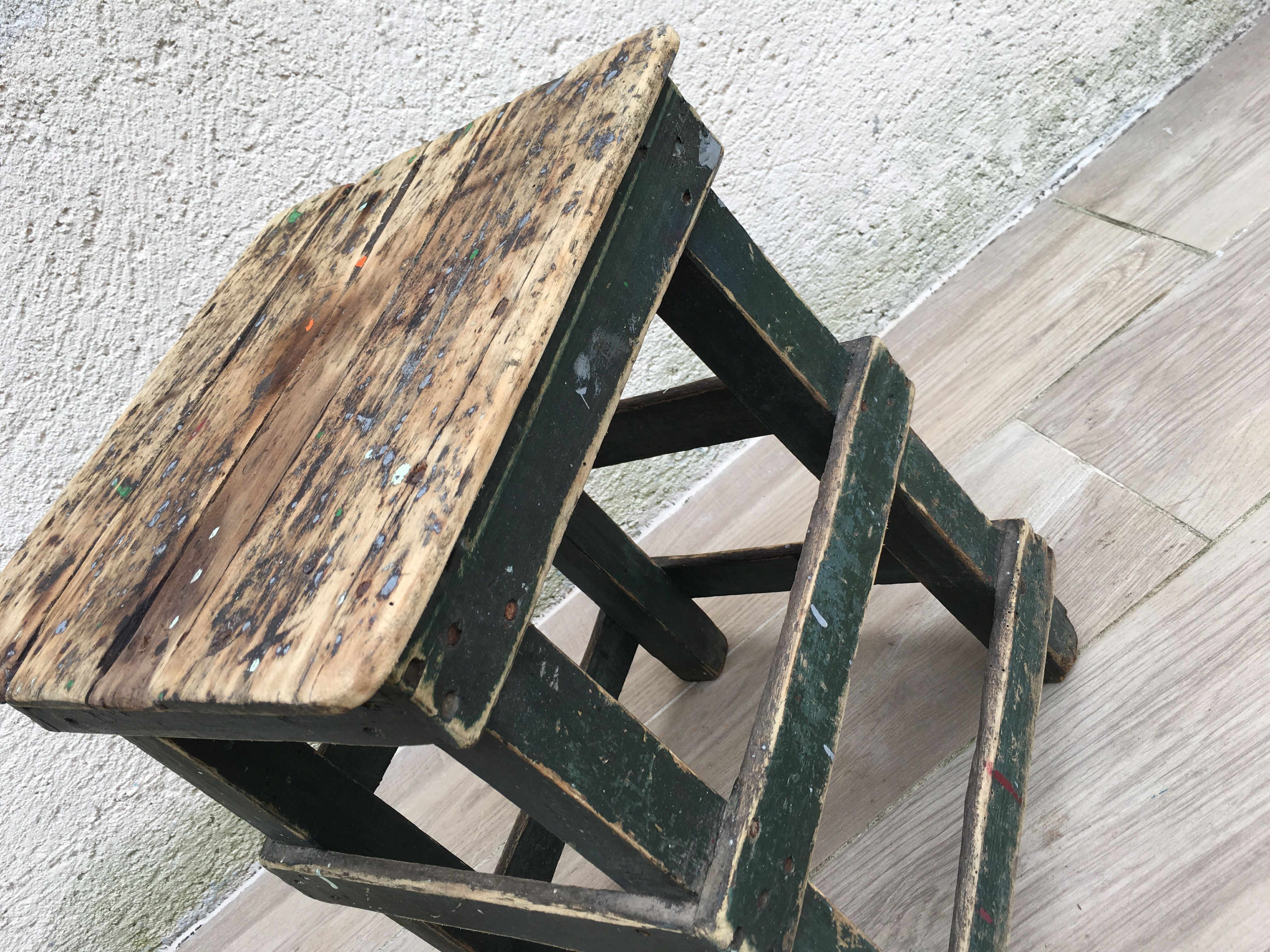 Former green workshop stool