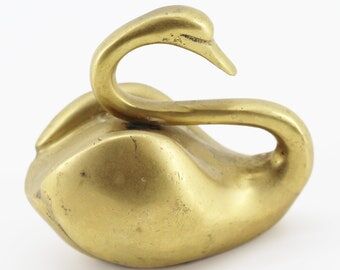 Brass swan statue