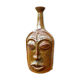 Ceramic depicting a stylized face