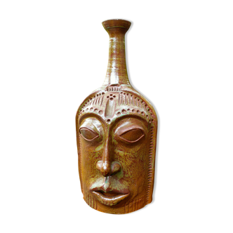 Ceramic depicting a stylized face