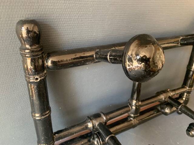 Wall-mounted coat rack in wood 1900