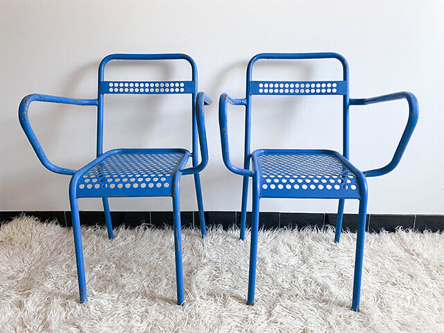 Pair of perforated metal garden chairs