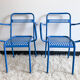 Pair of perforated metal garden chairs