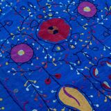 Midnight blue suzani kilim rug with embroidered patterns