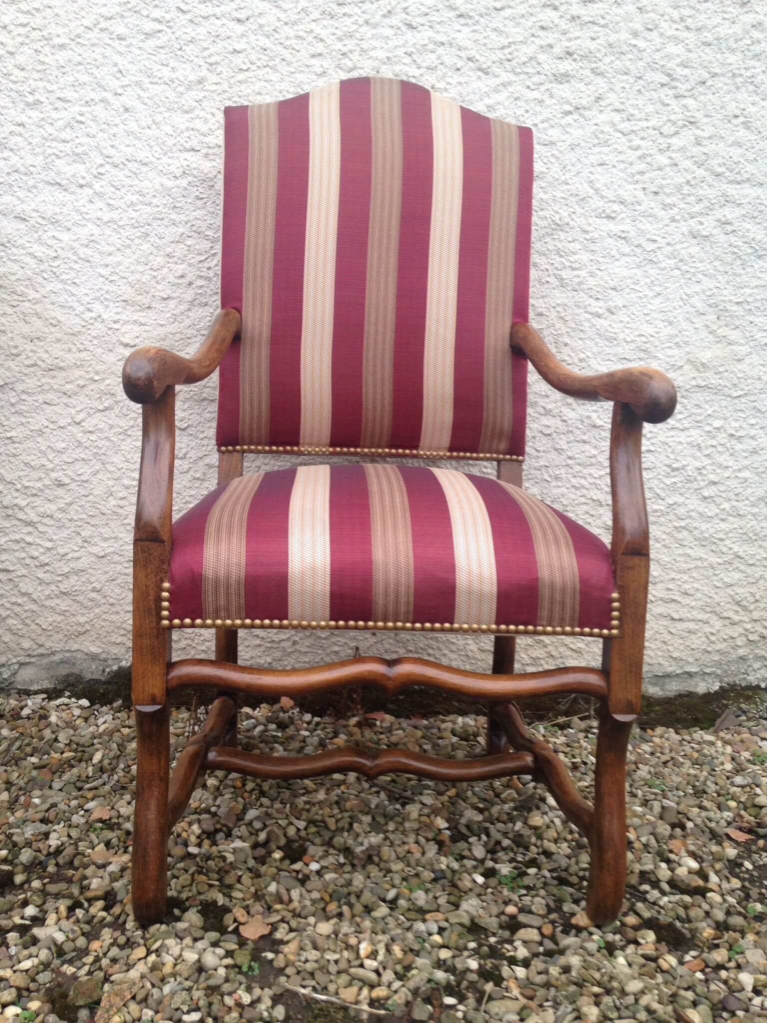 Pair of re-lined Louis XIII armchairs