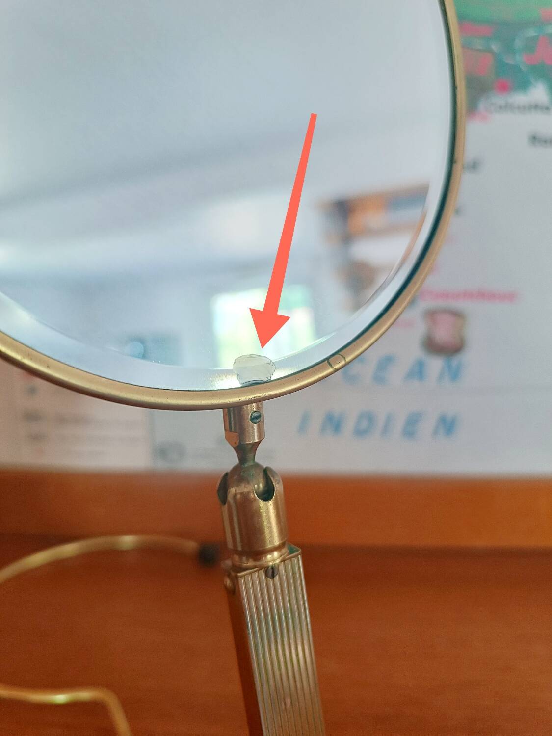 Vintage midi century brass barber mirror