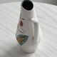 Ceramic pitcher with hand painted floral pattern