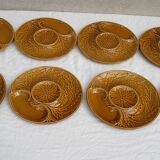 8 artichoke plates in earthenware