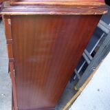 Scribanne bookcase in mahogany veneer English work of the twentieth century