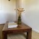 Solid wood coffee table with marquetry top