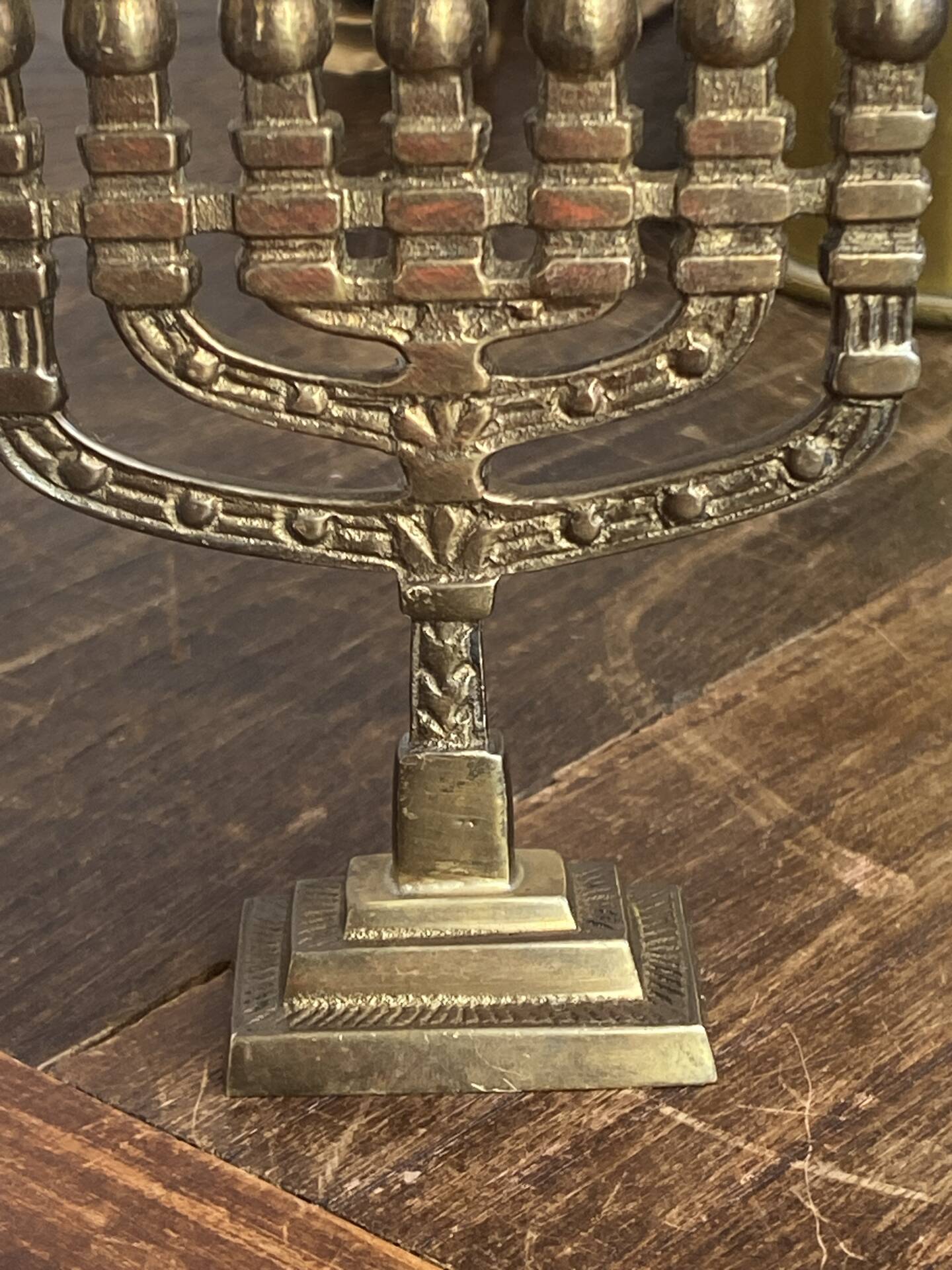 Chandelier, seven-branched menorah, in brass.