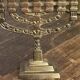 Chandelier, seven-branched menorah, in brass.