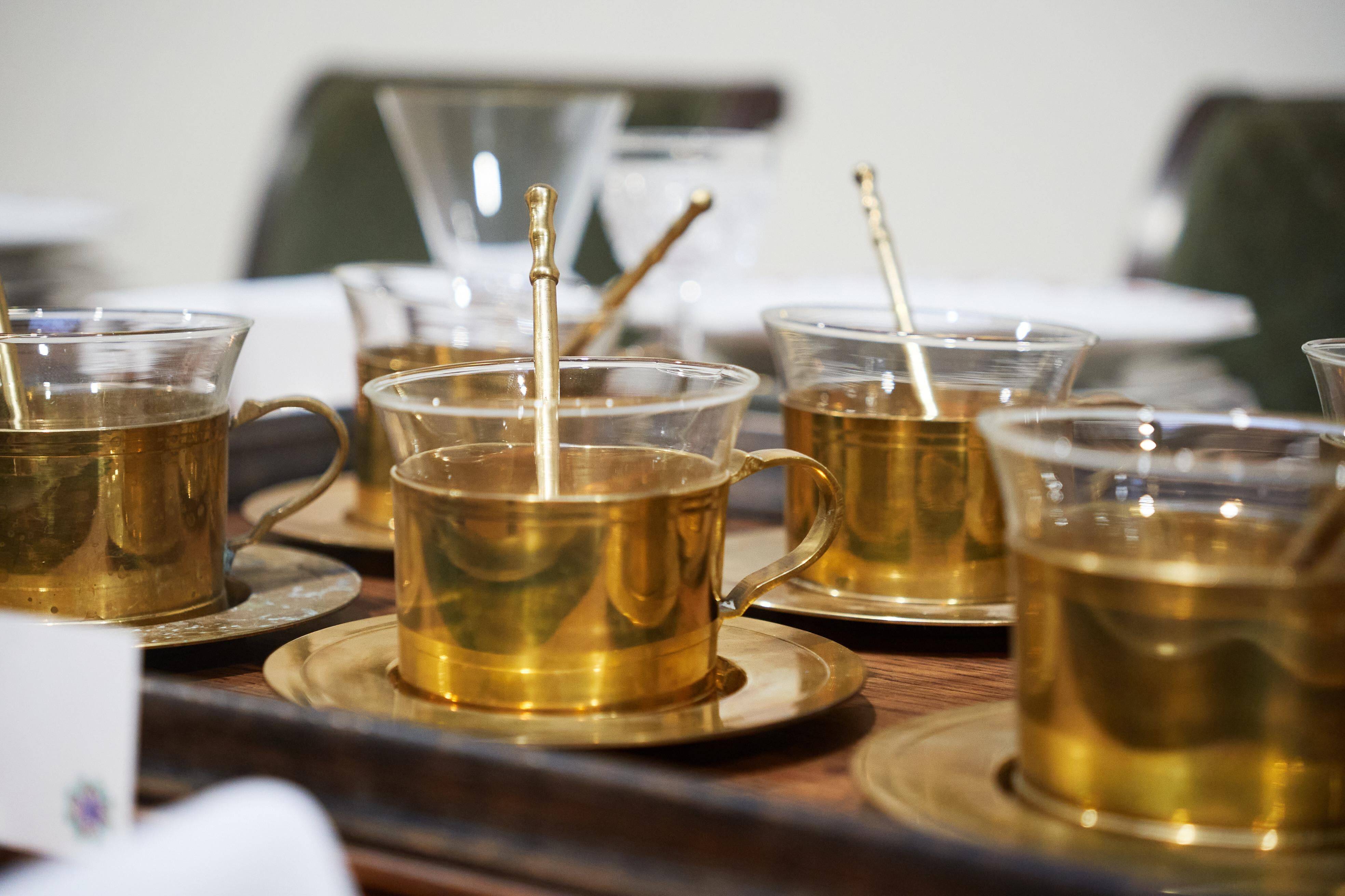 Mid-century tea service in patinated brass and glass