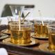 Mid-century tea service in patinated brass and glass
