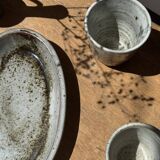 Petit plat ovale en céramique mouchetée glacée L23