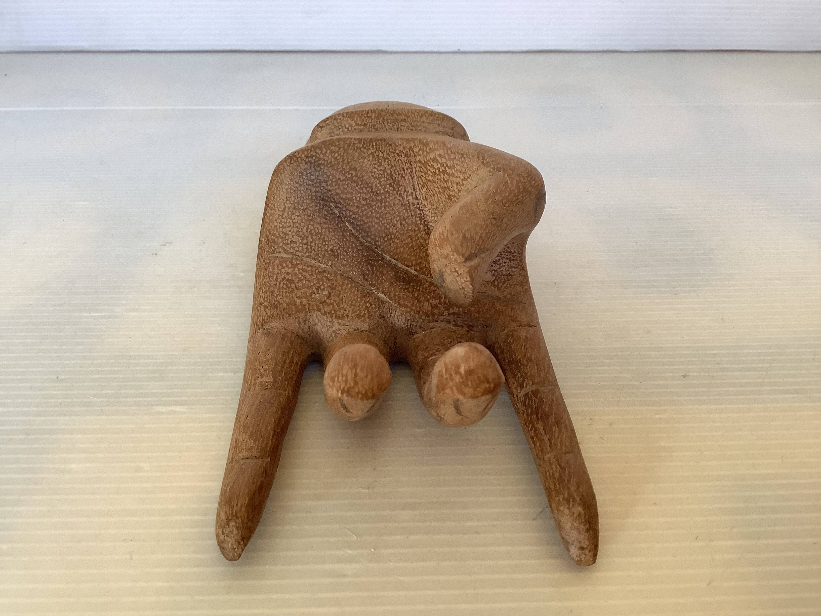 Wooden hand ring sizer pocket emptier