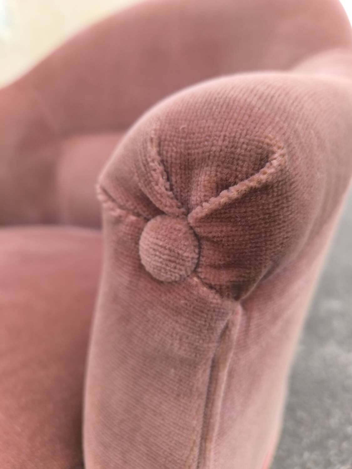 Pink velvet convertible armchair