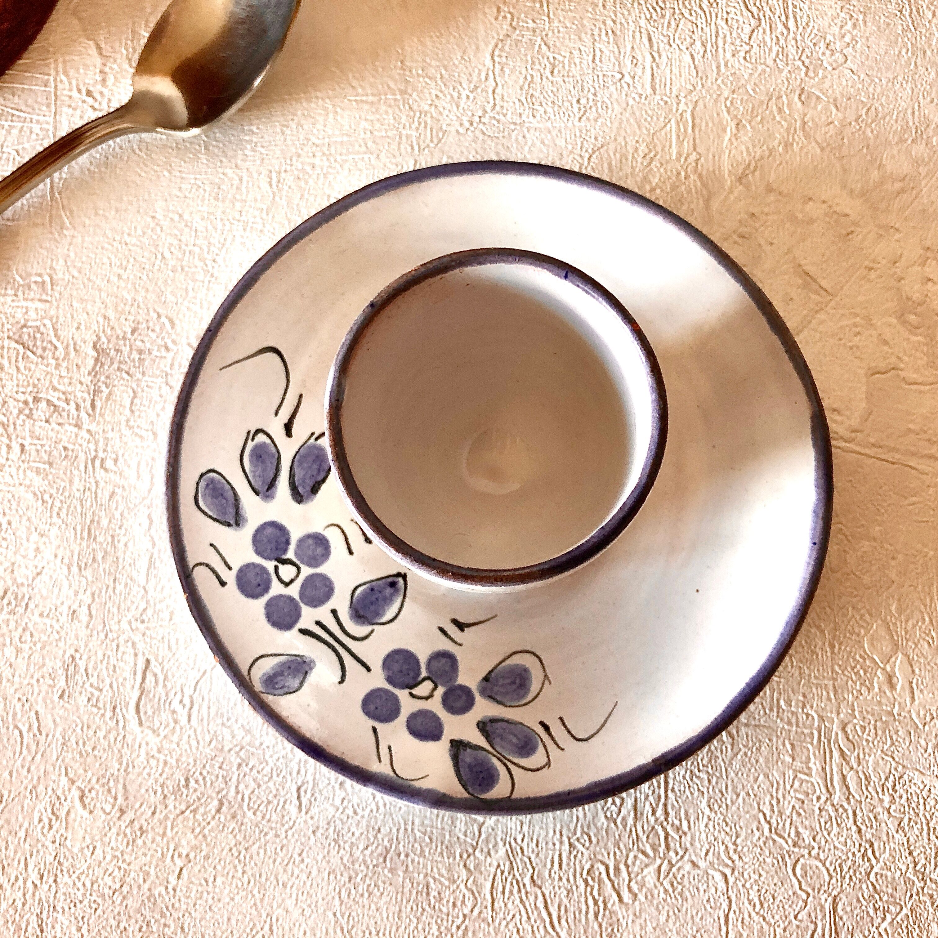 Glazed ceramic shell with painted floral decoration