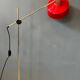 Adjustable red floor lamp in the style of Hoogervorst.