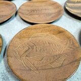 Set of 12 plates decorated with fish by robert picault