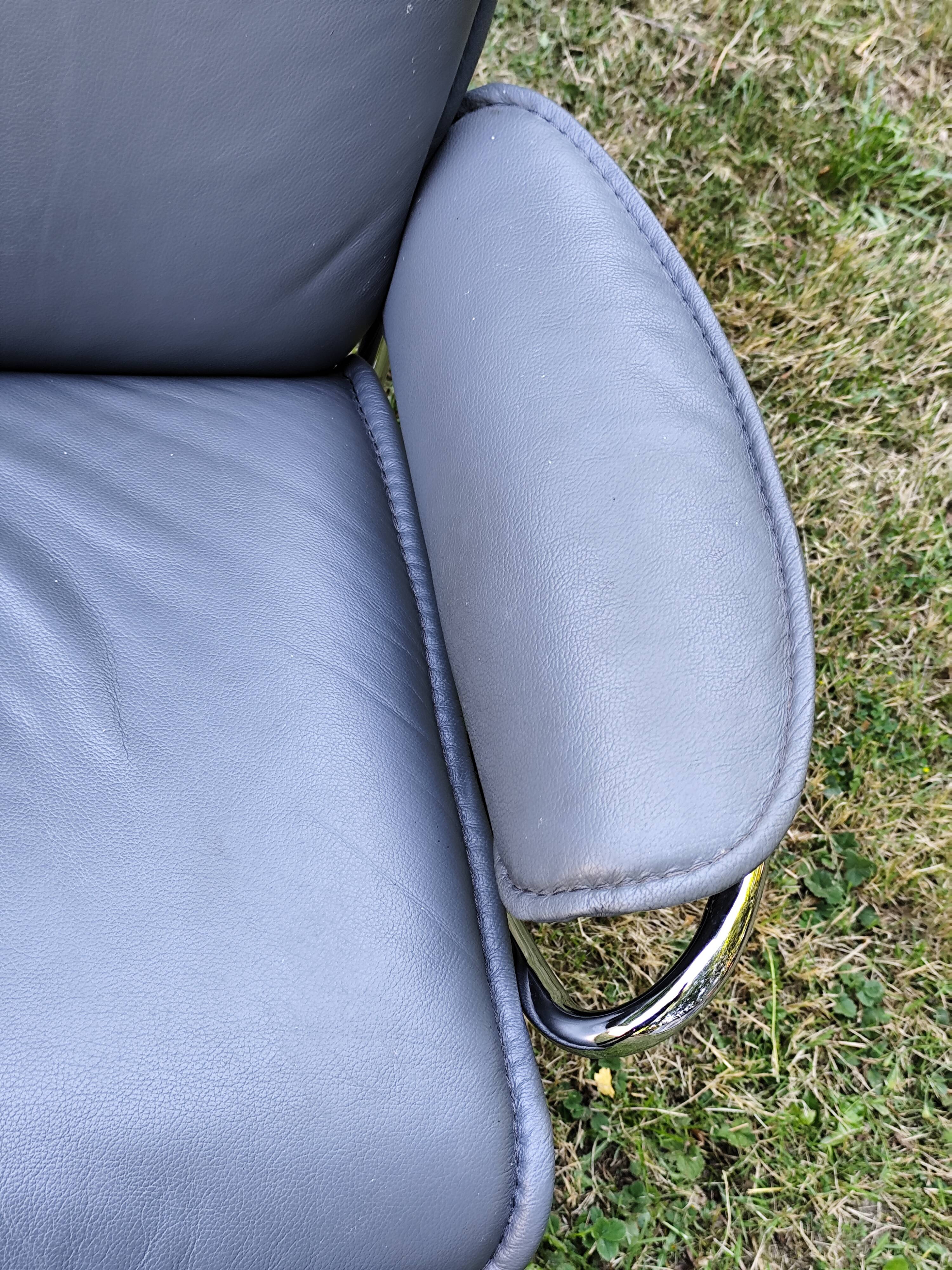 Stressless City armchair with footrest/ottoman, grey